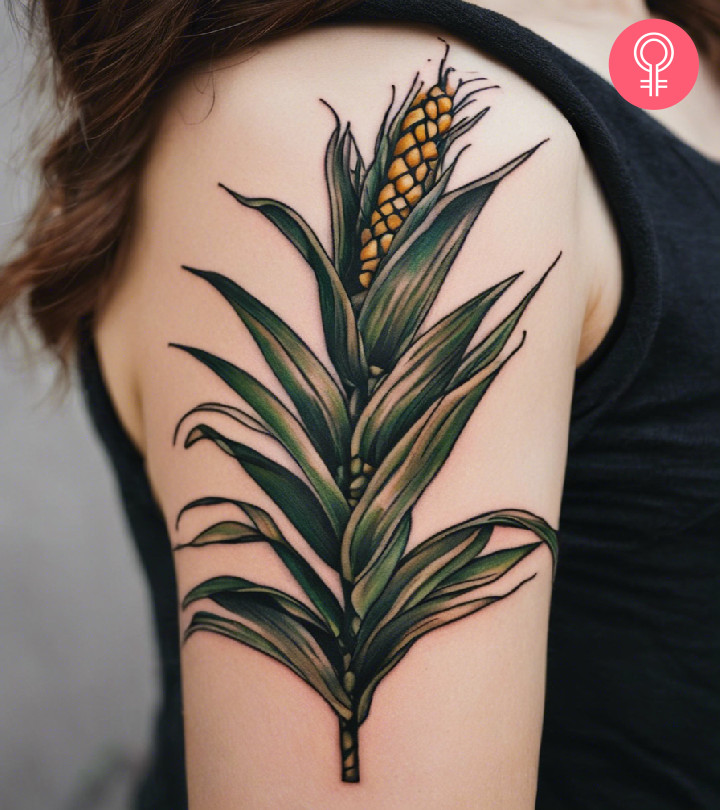 Woman with corn tattoo on her upper arm