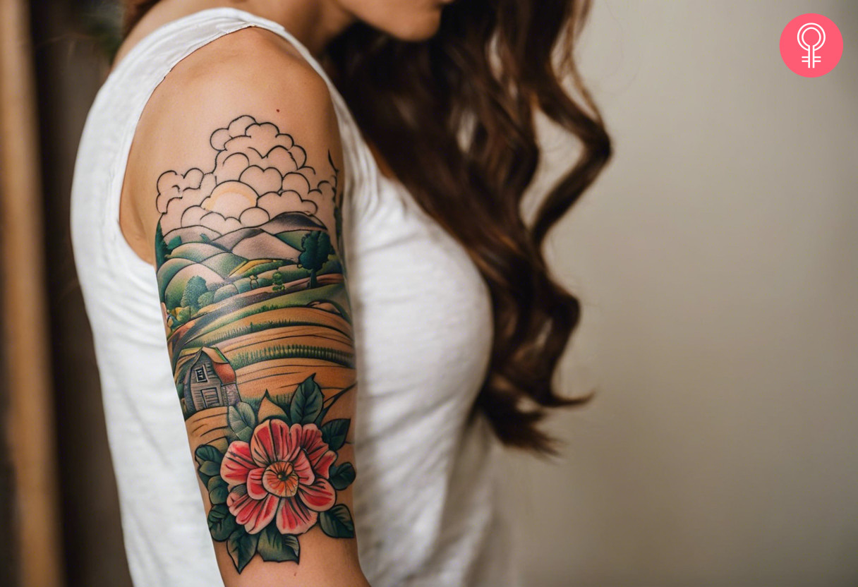 Woman with farm tattoo on her sleeve