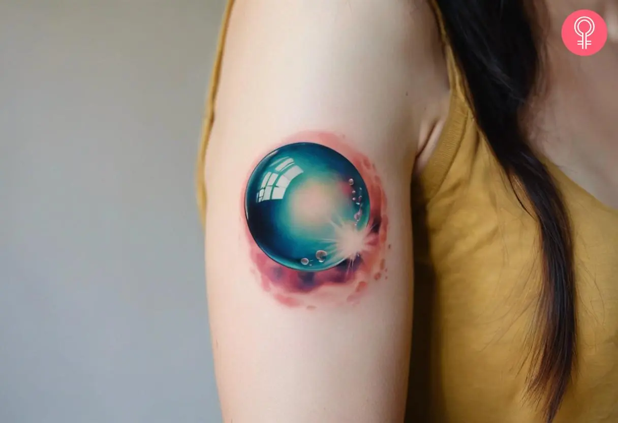 Woman with realistic bubble tattoo on her outer arm