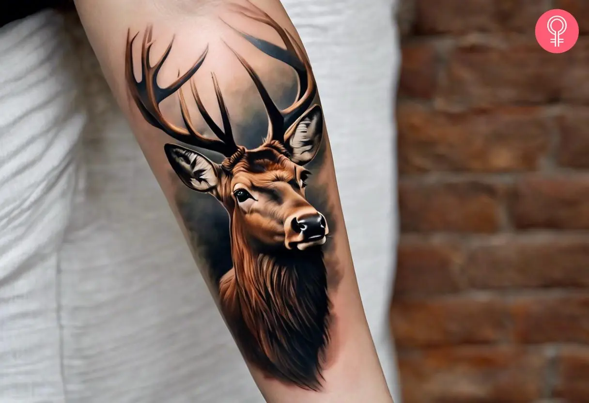 Woman with realistic elk tattoo on her forearm