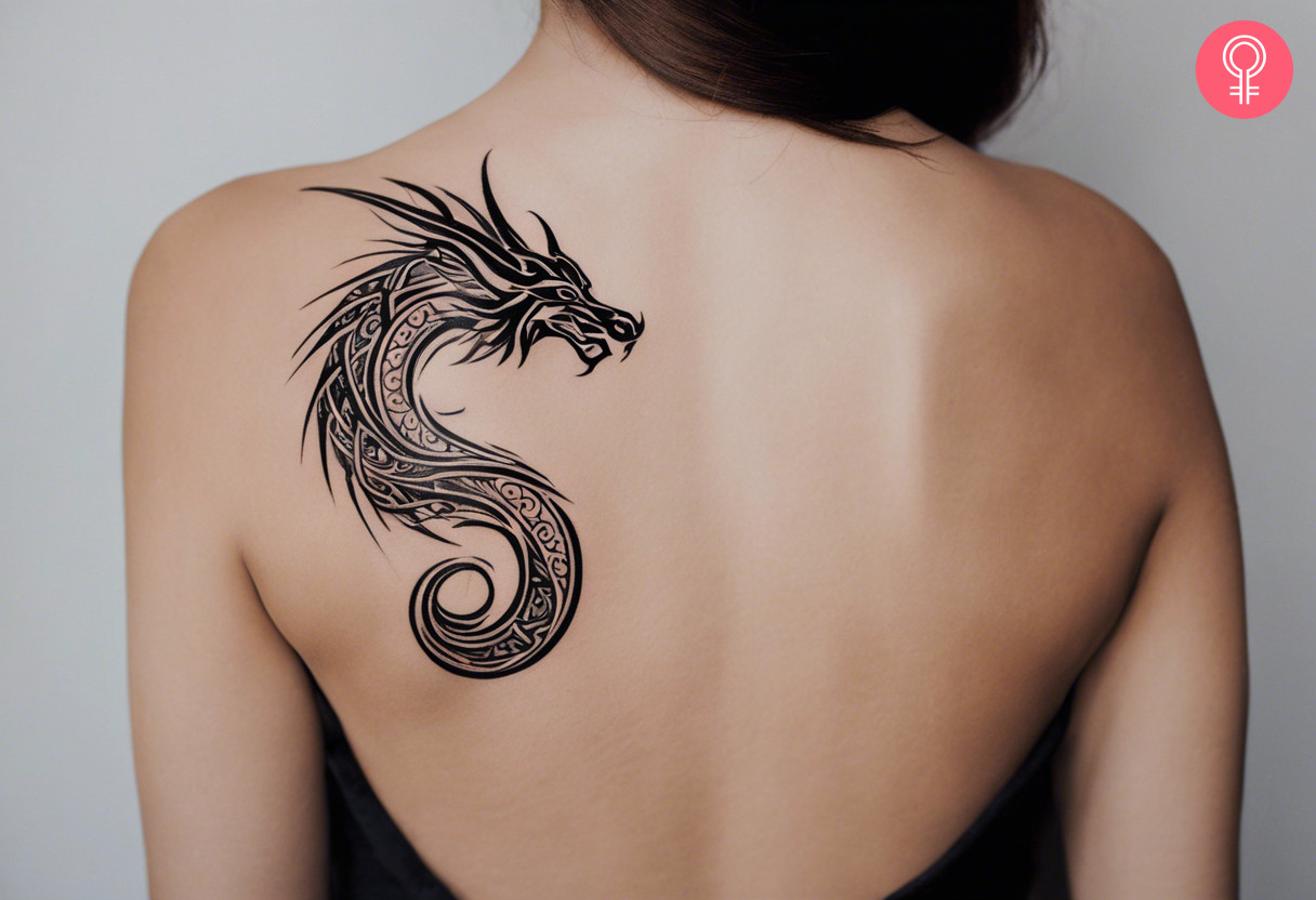 Woman with shoulder tribal dragon tattoo