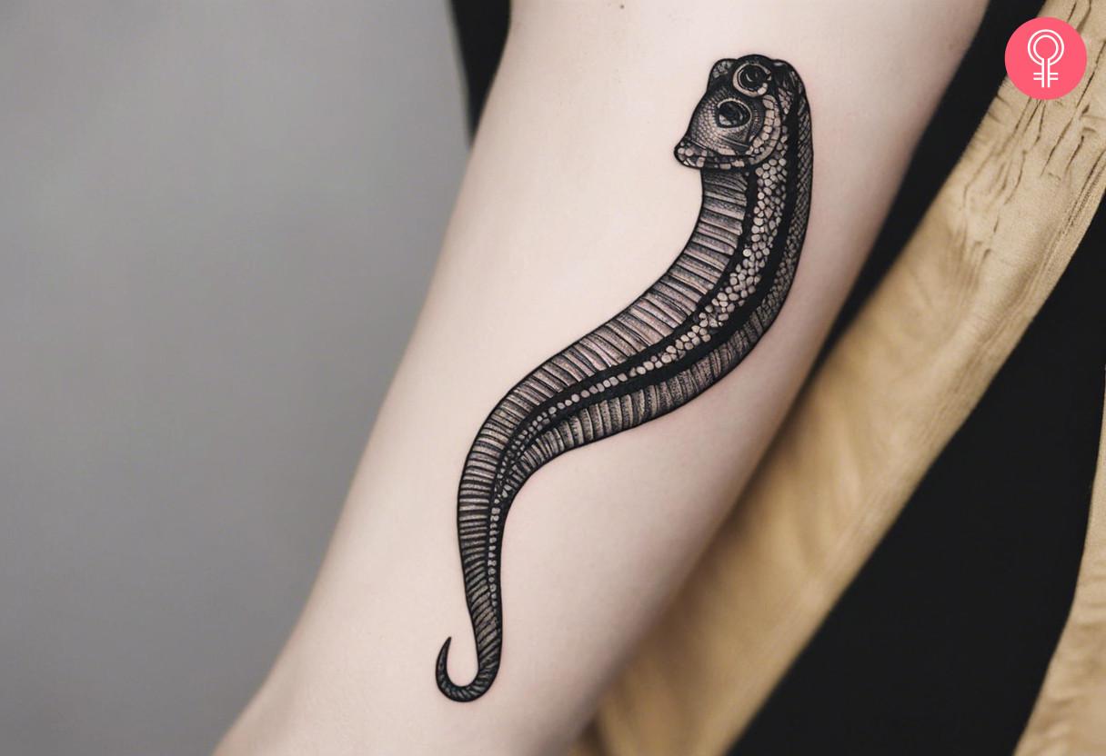 8 Mesmerizing Eel Tattoos to Ignite Your Ink Inspiration - 25