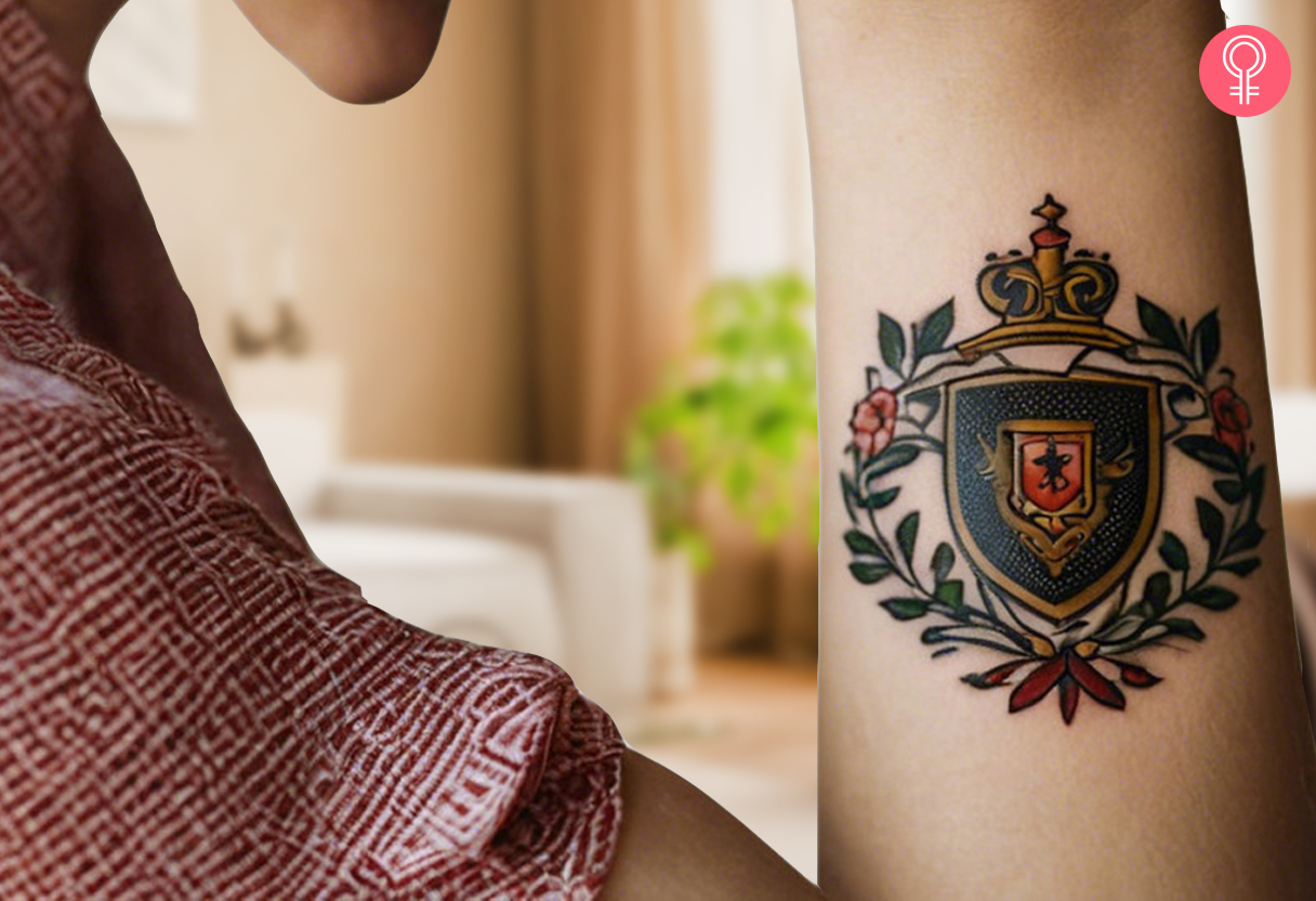 Woman with traditional family crest tattoo on her forearm