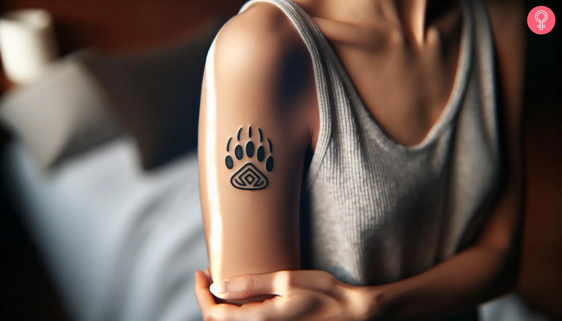 Woman with tribal bear paw tattoo