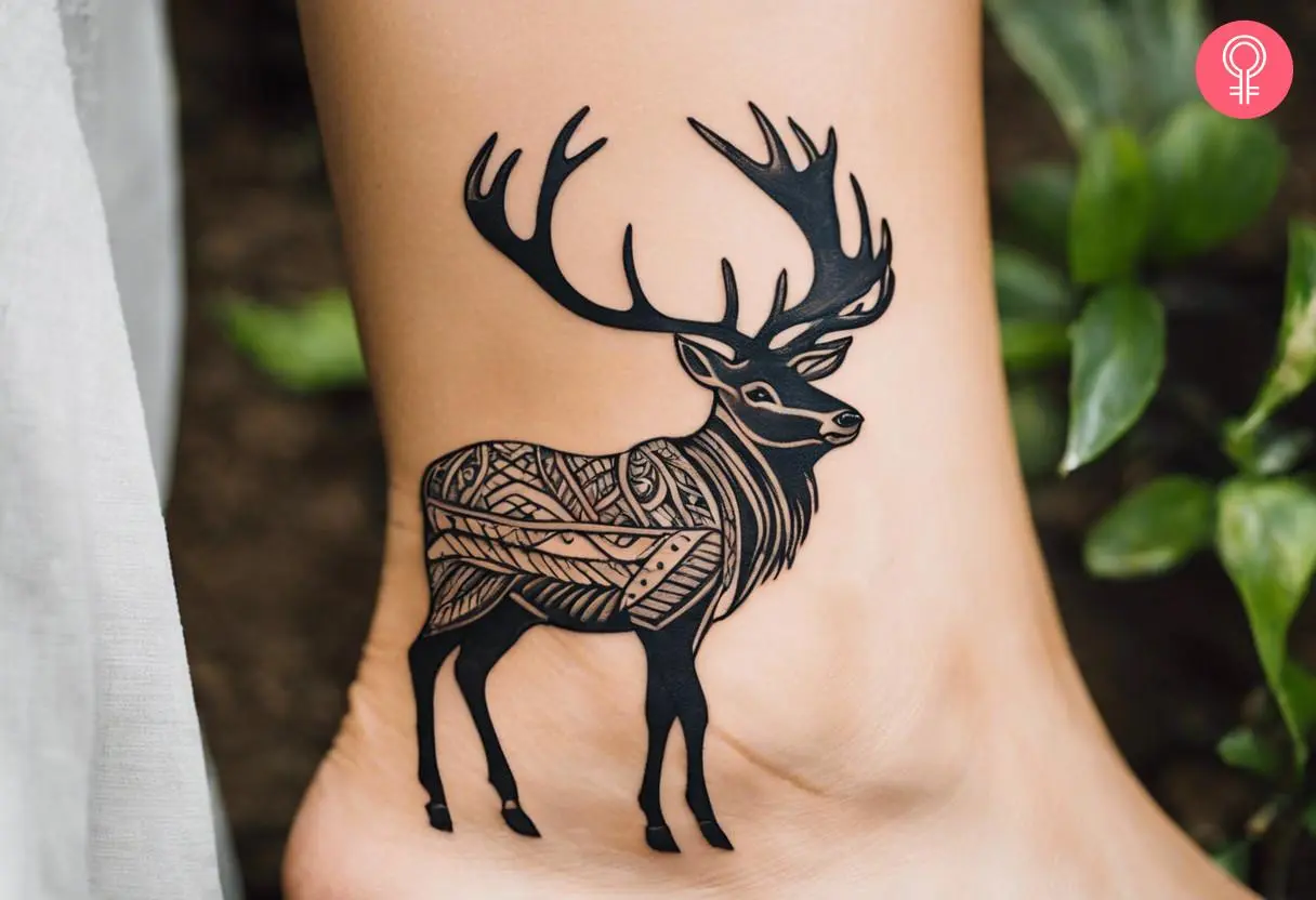 Woman with tribal elk tattoo on her ankle