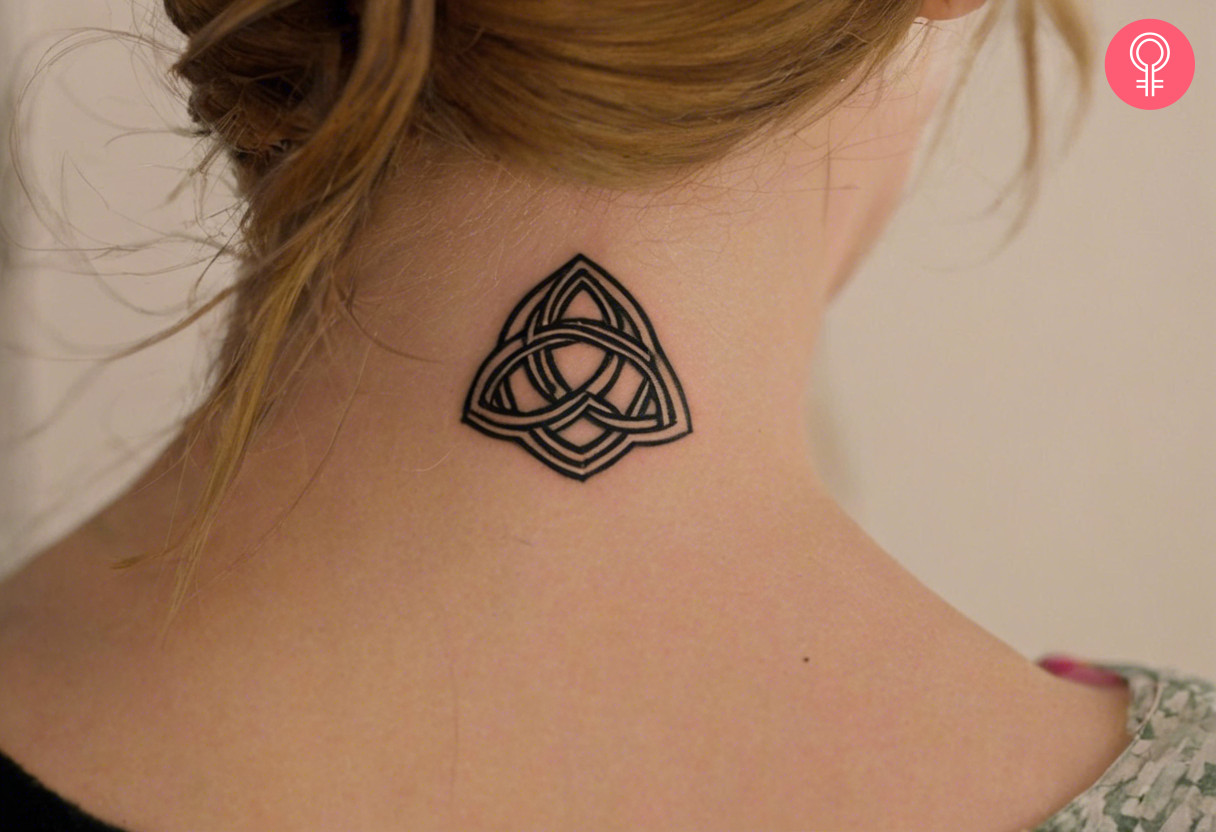 Woman with warrior celtic knot tattoo on the back of her neck