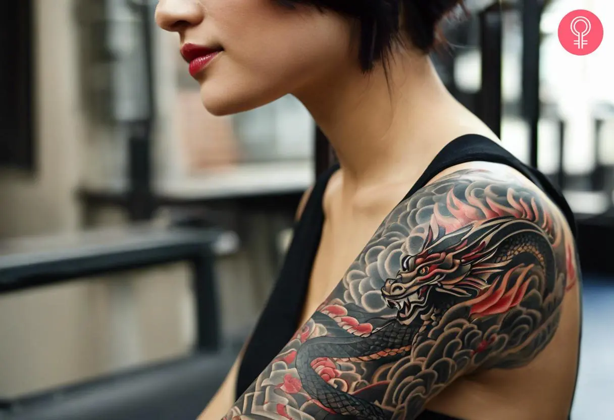 Woman with yakuza dragon tattoo on her arm