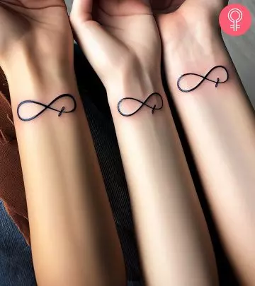 A woman with a black family infinity tattoo on her shoulder