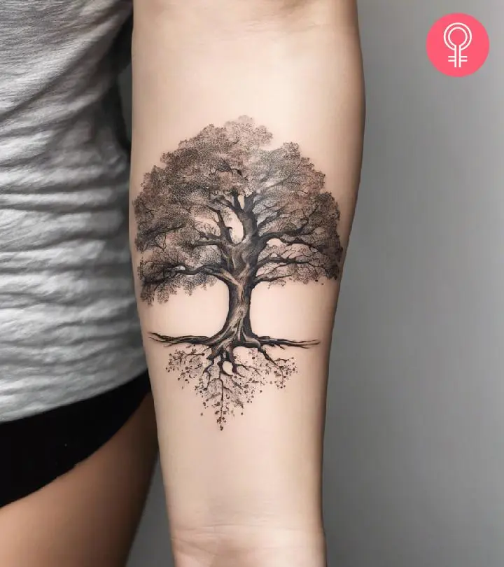 Woman with oak tree tattoo on her arm