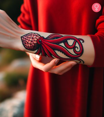 A boxer tattoo on a woman’s bicep