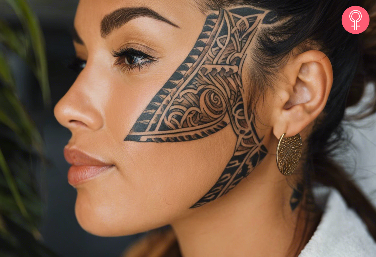 A Polynesian tattoo that covers one side of the face and hairline