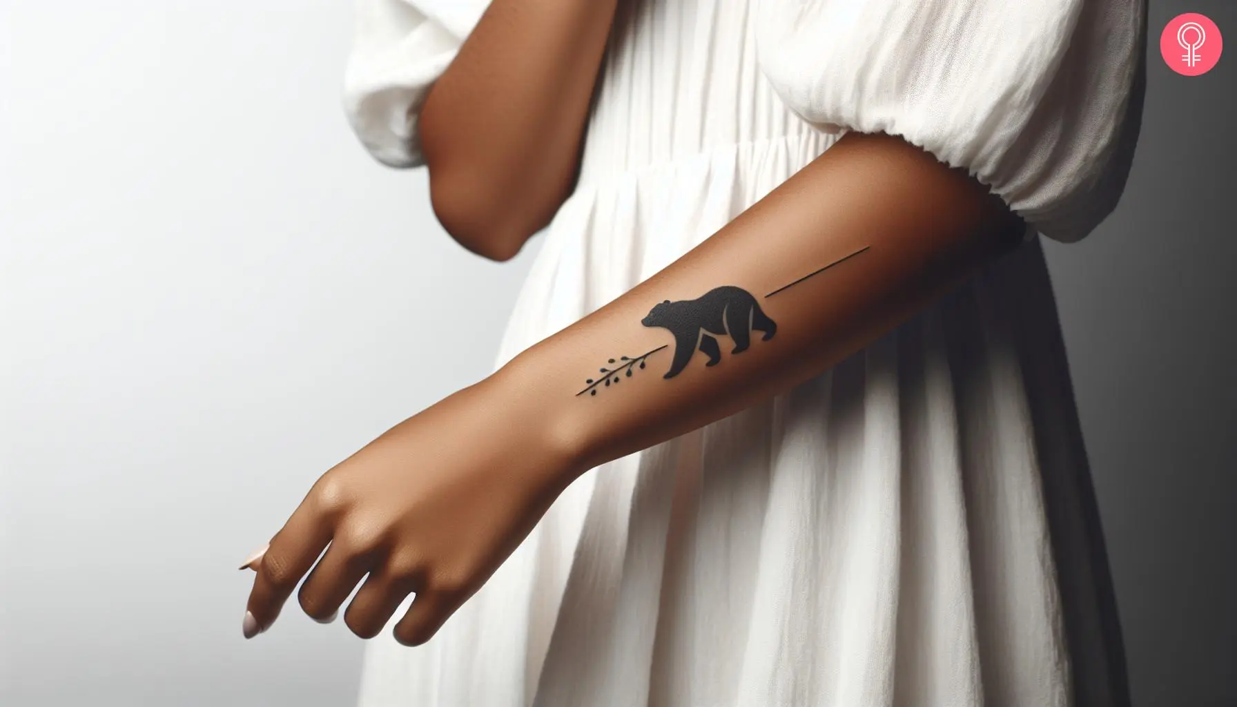 A black bear silhouette walking on the forearm