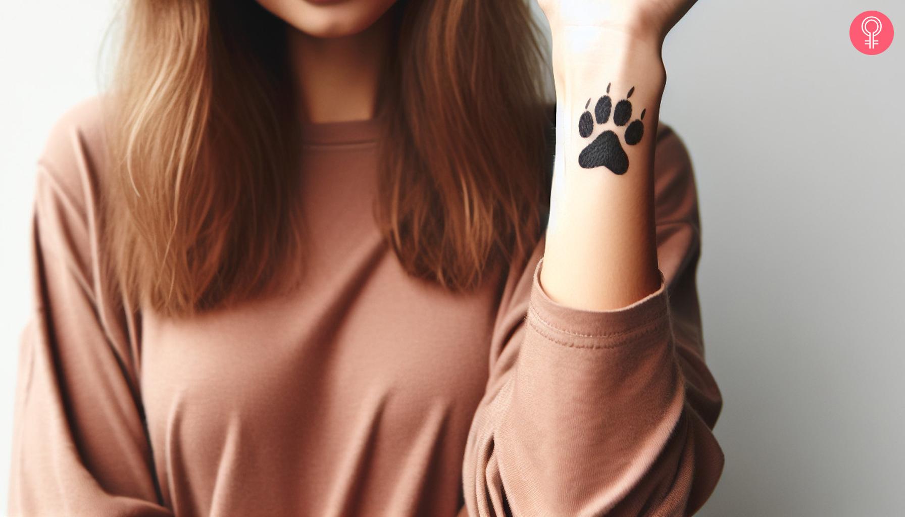 A dog paw print on the wrist