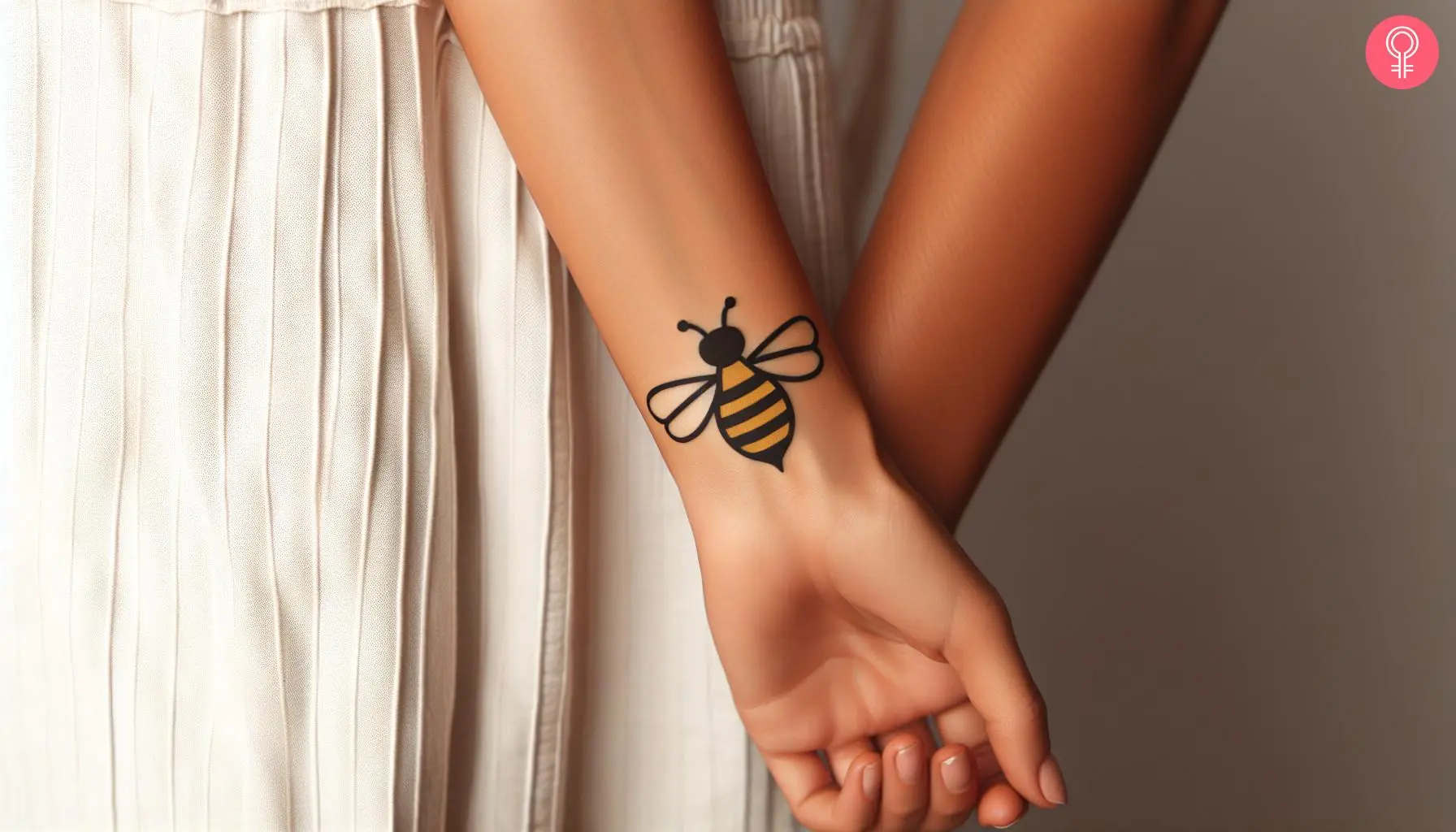 A fine line bee tattoo on the wrist