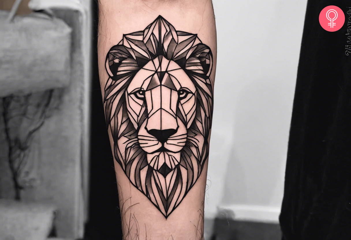 A geometric lion tattoo drawing on the forearm