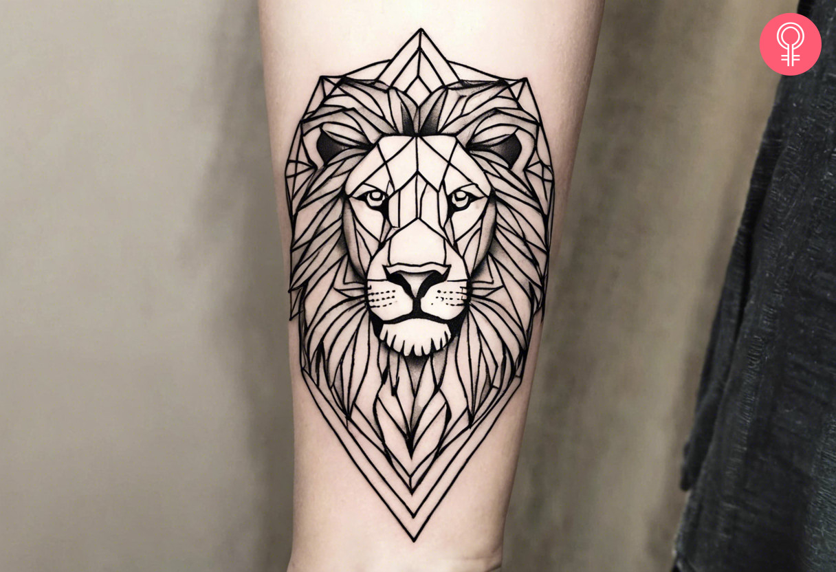 A geometric lion tattoo on the forearm