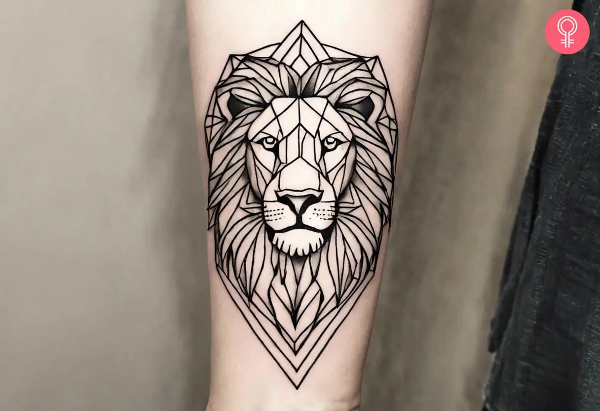 A geometric lion tattoo on the forearm