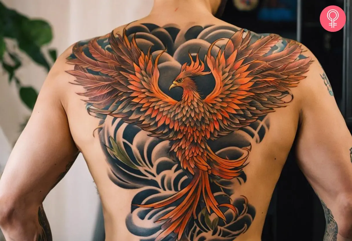 A man wearing a Japanese phoenix tattoo on his back