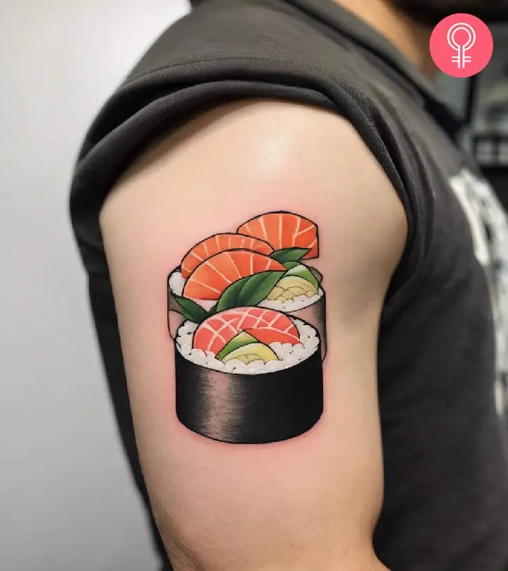 A man wearing a sushi tattoo on his upper arm