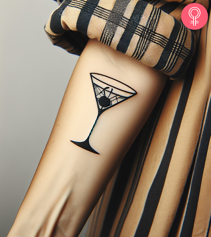 A martini tattoo on a woman's forearm.