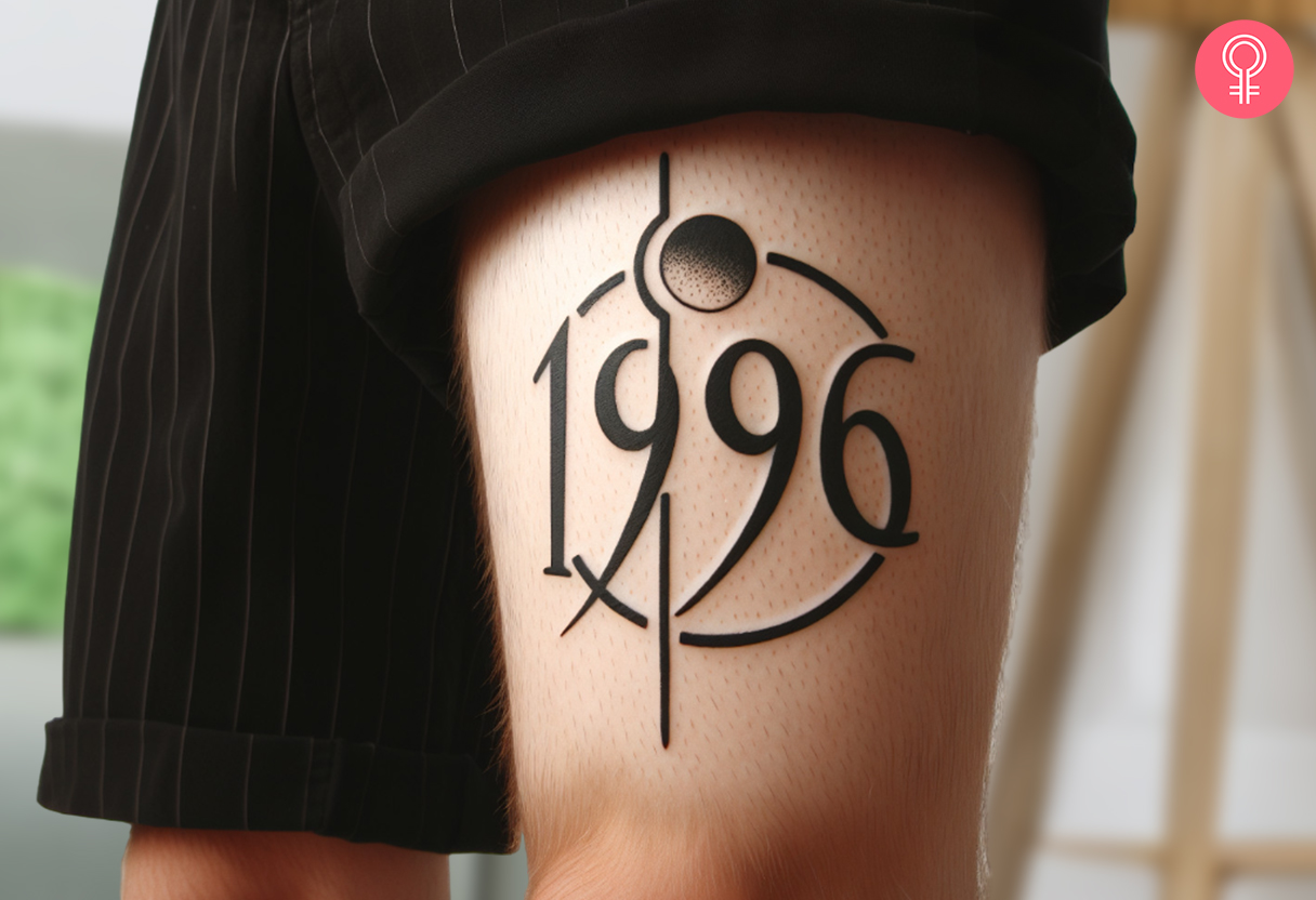 A minimalist 1996 tattoo inked above the knee