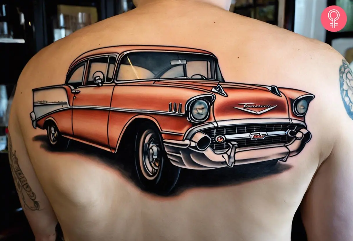 A peach-colored 57 Chevy tattoo on the back