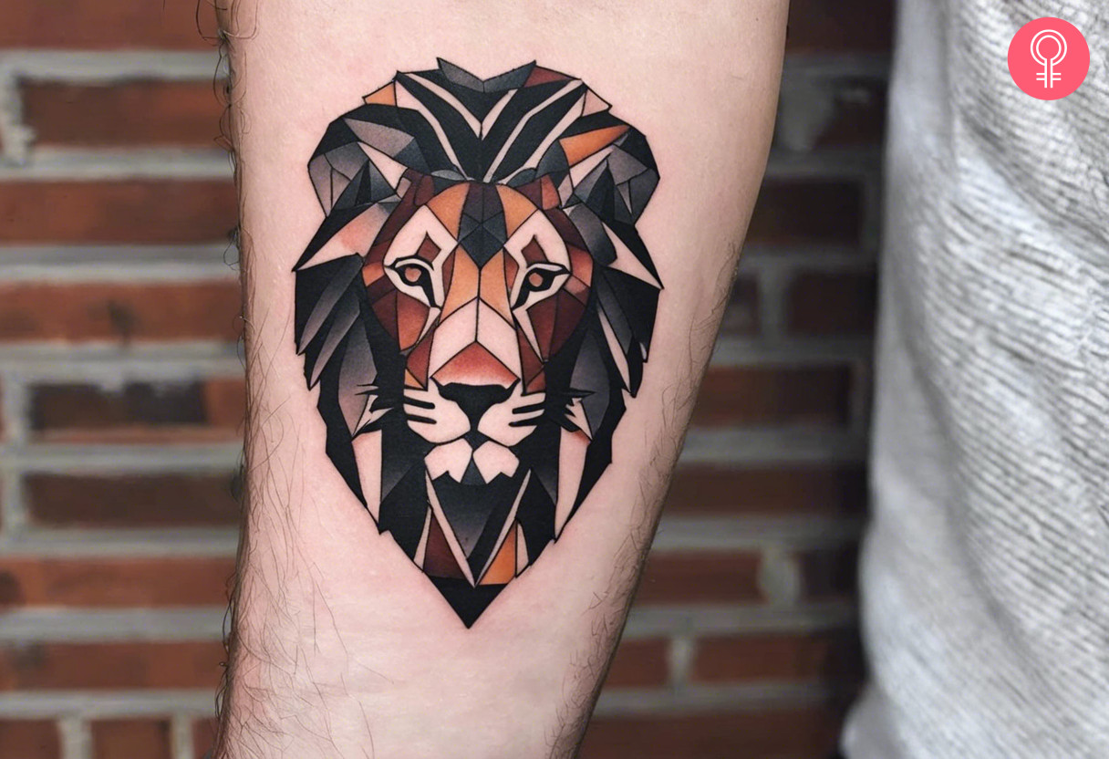 A sacred geometric lion tattoo on the forearm