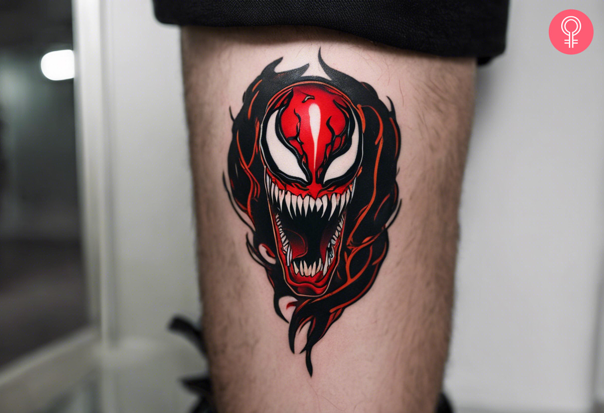 A small Carnage tattoo on the back of a man’s calf