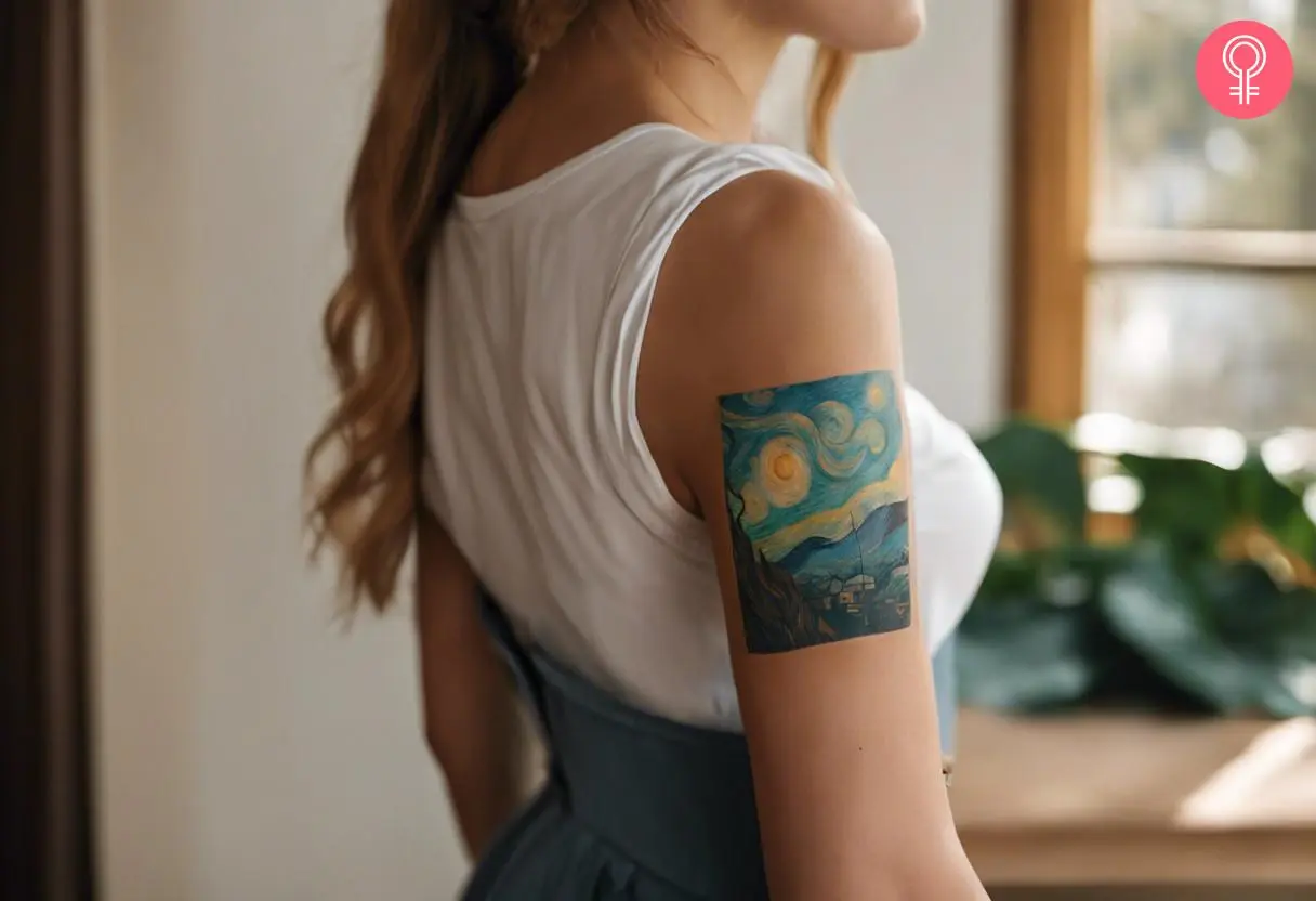 A small, rectangular tattoo of Starry Nights on the upper arm