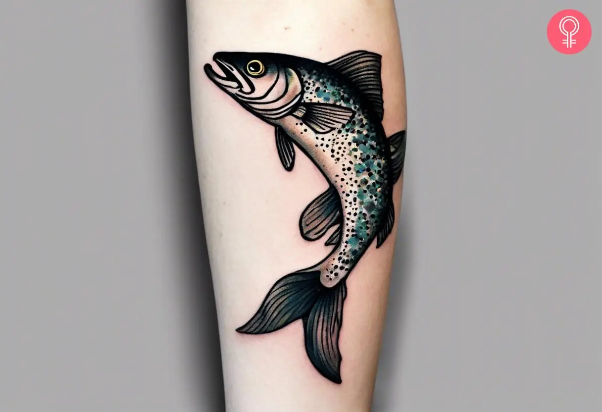 A speckled trout inked on a woman’s forearm.