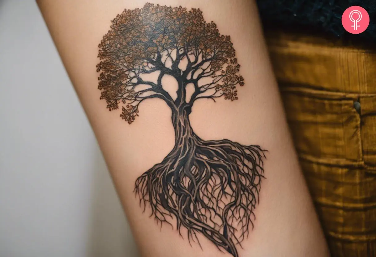 A woman flaunting tree roots tattooed on her forearm