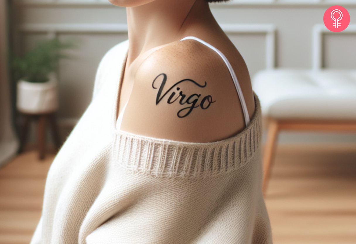 A woman wearing a Virgo zodiac tattoo on the upper arm