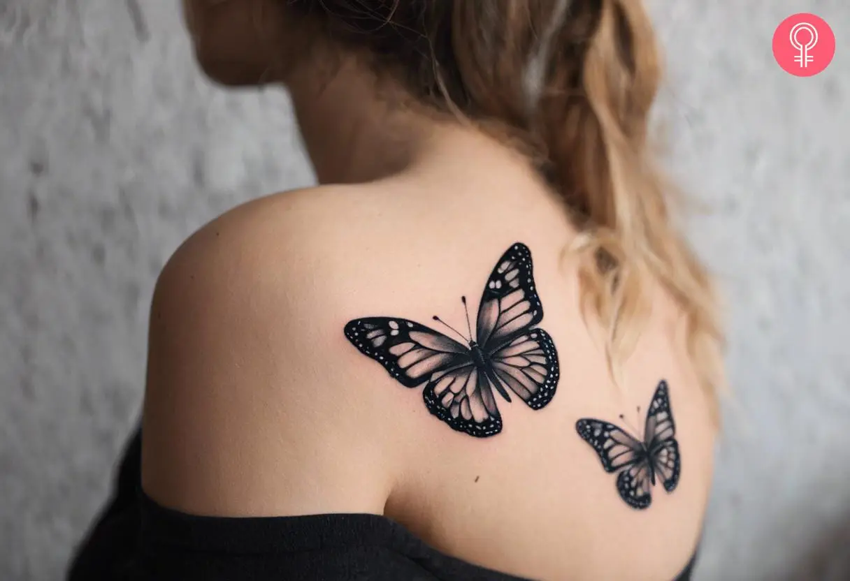 A woman wearing a butterfly shoulder tattoo on the back