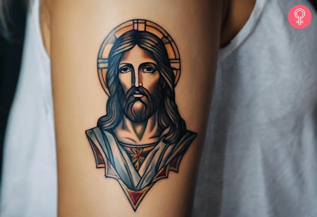 A woman with a Jesus Christ tattoo on her arm