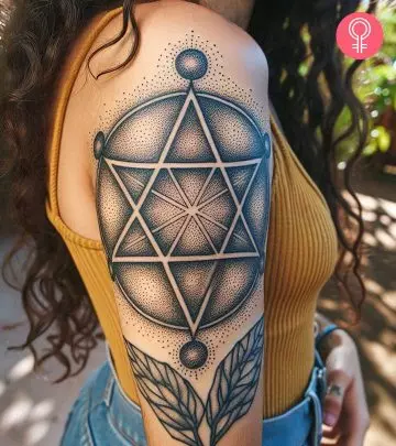 A woman with a Merkaba tattoo