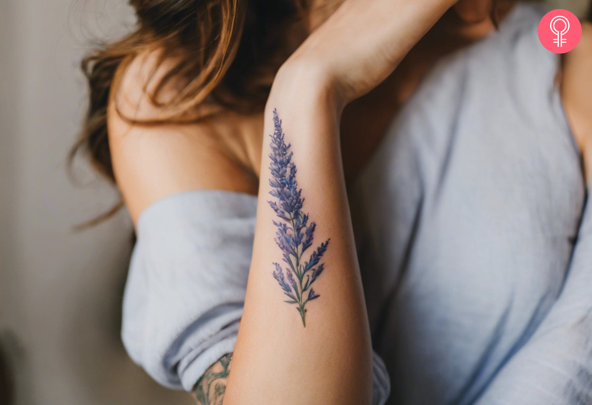 A woman with a Russian sage tattoo on her forearm