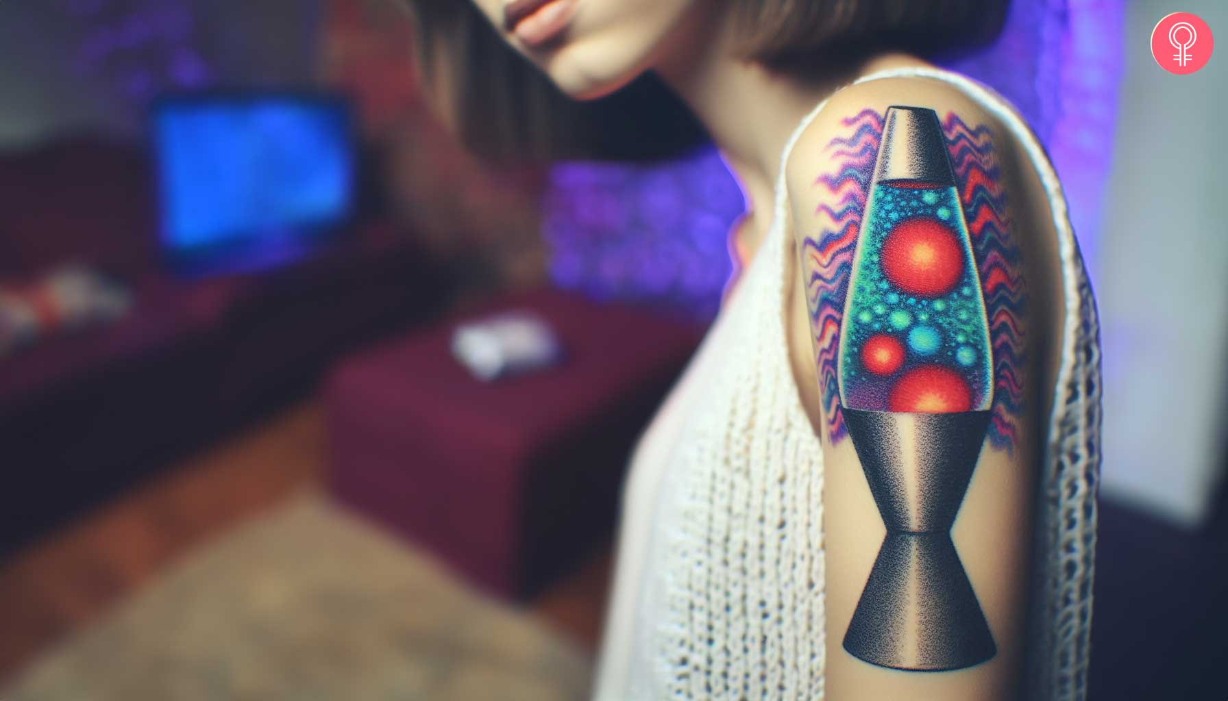 A woman with a colorful trippy lava lamp tattoo on her upper arm