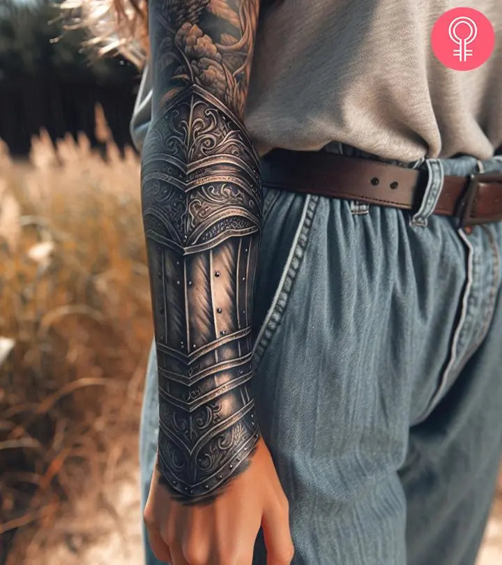 A woman with a gauntlet tattoo on the forearm.