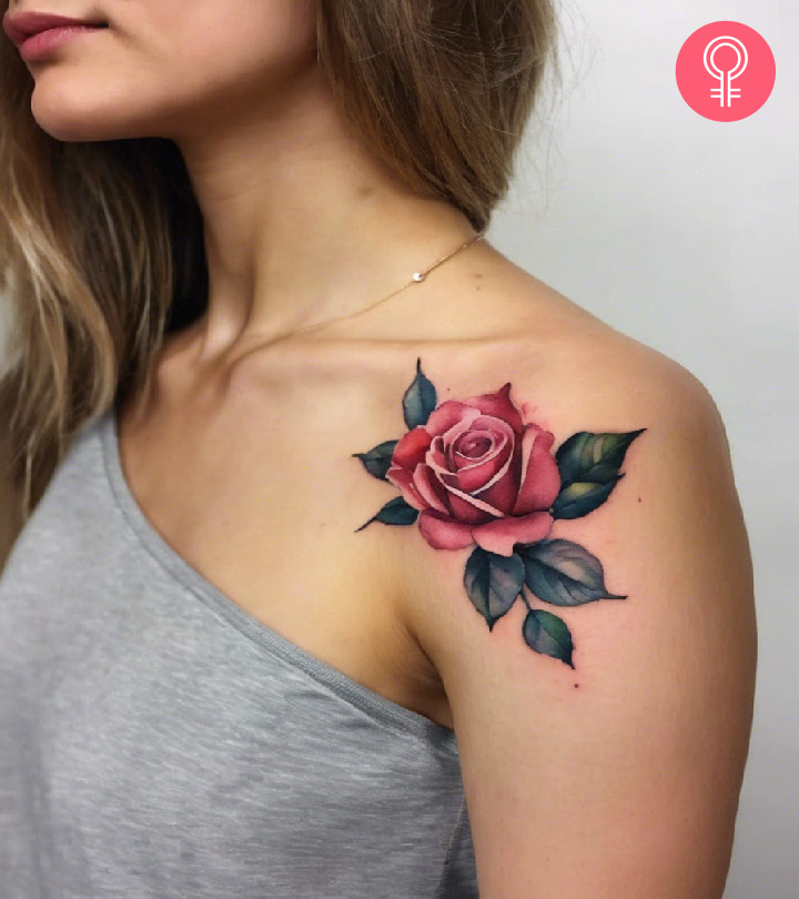 A woman with a rose tattoo on her shoulder