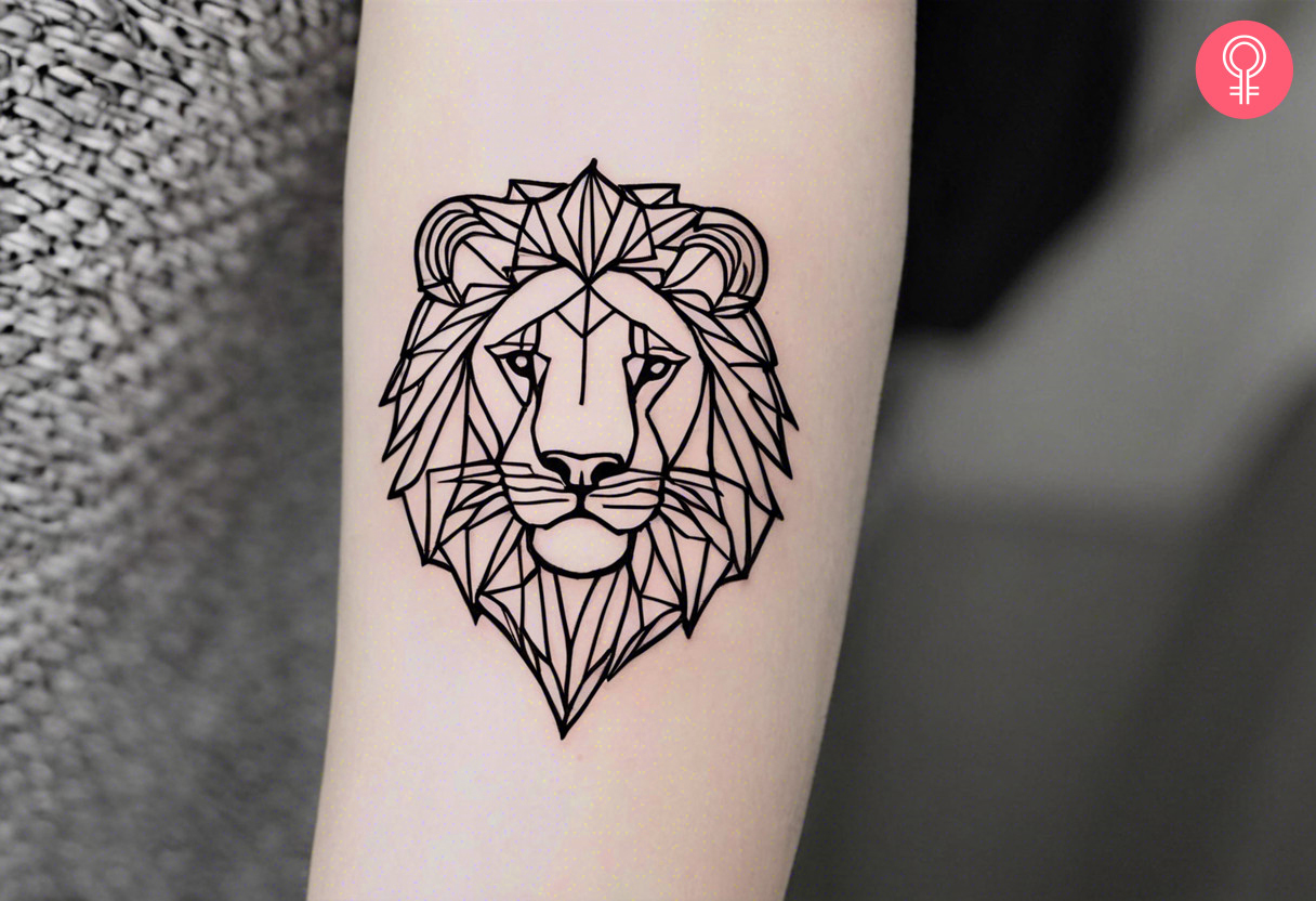 An outline geometric lion tattoo on the forearm