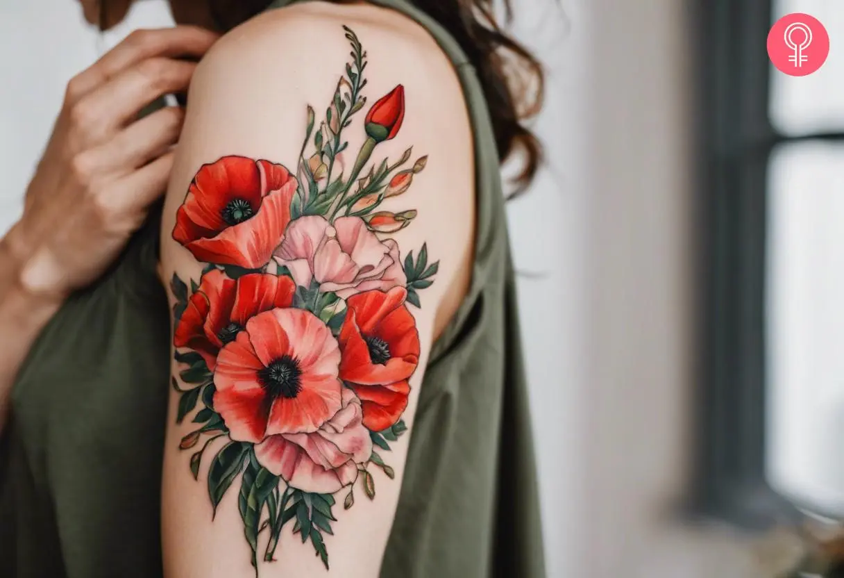 An August birth flower bouquet tattoo on a woman’s arm