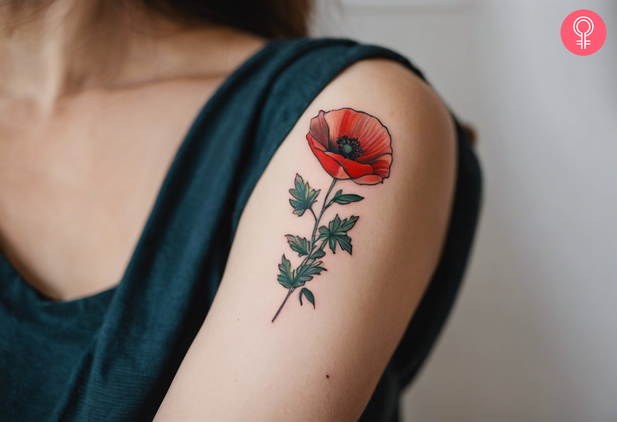 An August birth flower tattoo on a woman’s arm