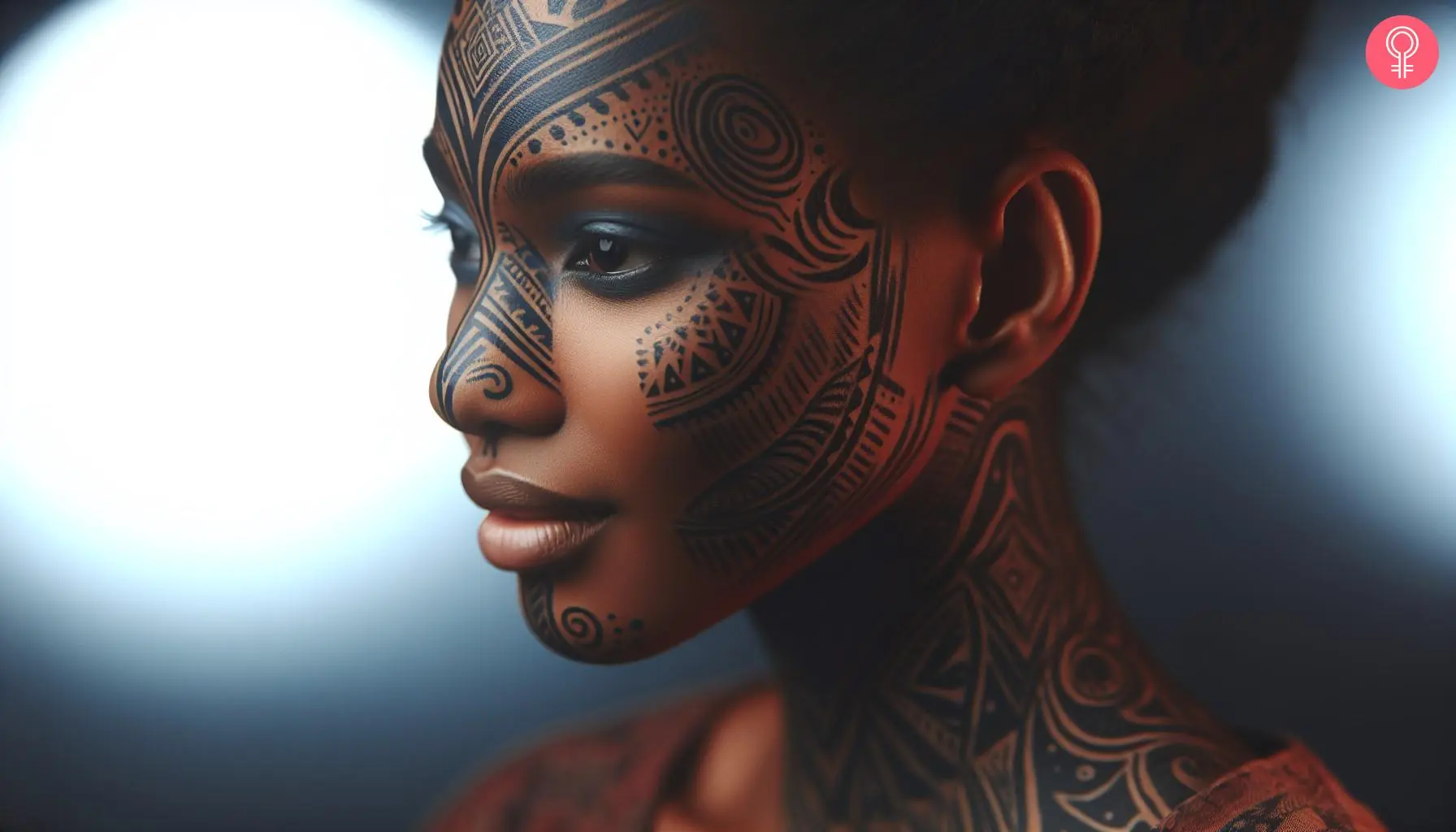 Black ink tribal tattoos on the forehead and cheekbones