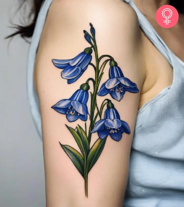 Bluebell flower tattoo on the arm