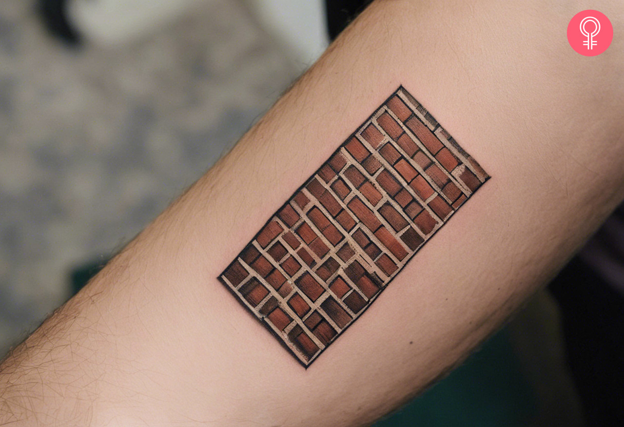 A rectangle tattoo of a traditional brick wall background