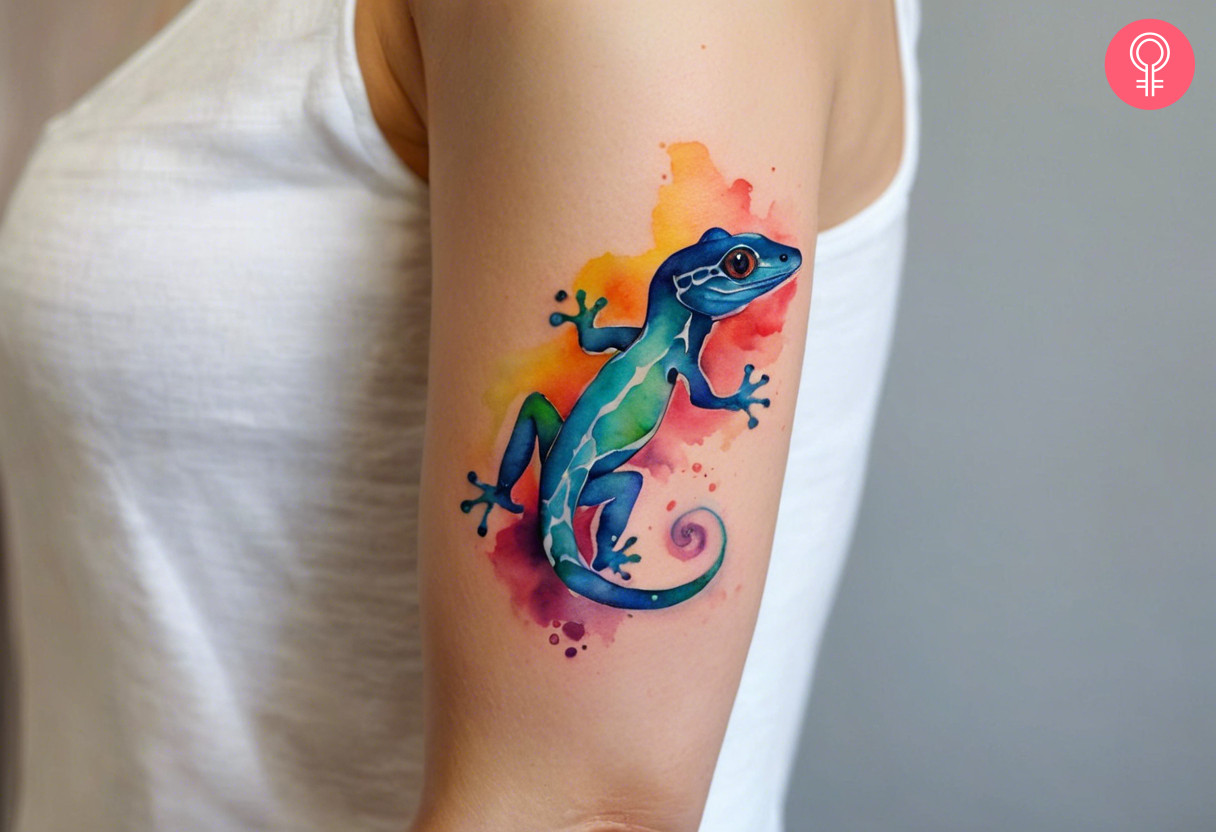 Colorful geck tattoo on a woman’s arm