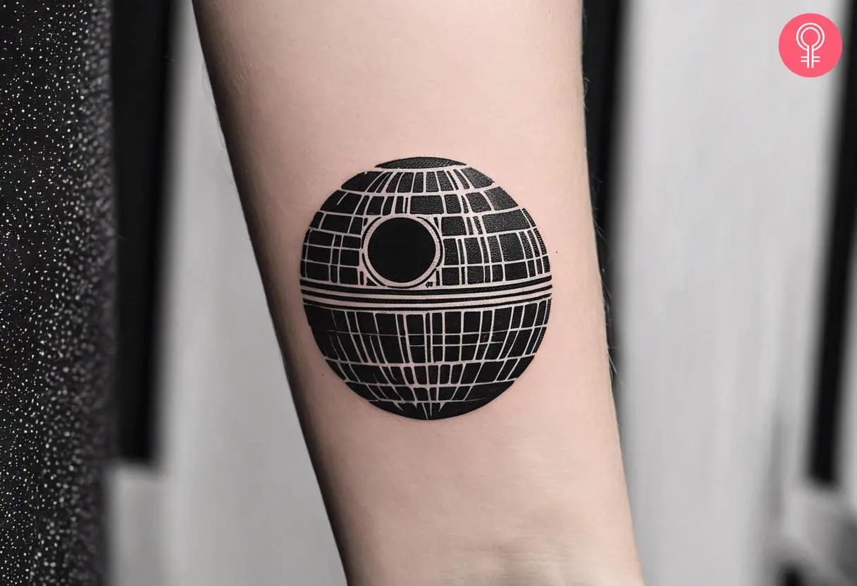 Death star tattoo on the forearm