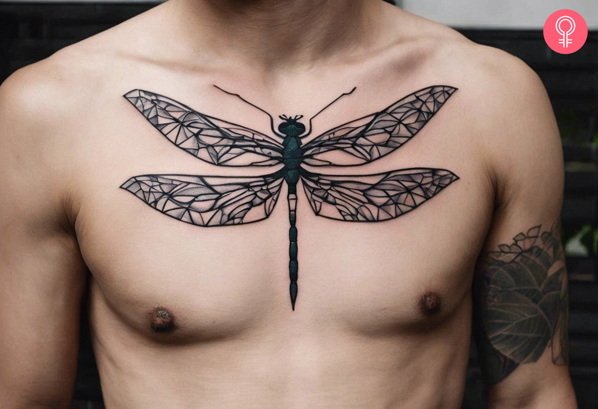 A geometric dragonfly chest tattoo