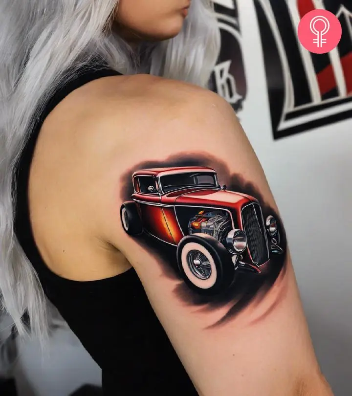 A woman with a hot rod tattoo on her arm