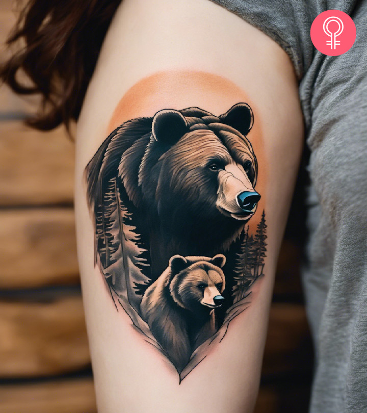 A woman with a bear and cub tattoo on her upper arm